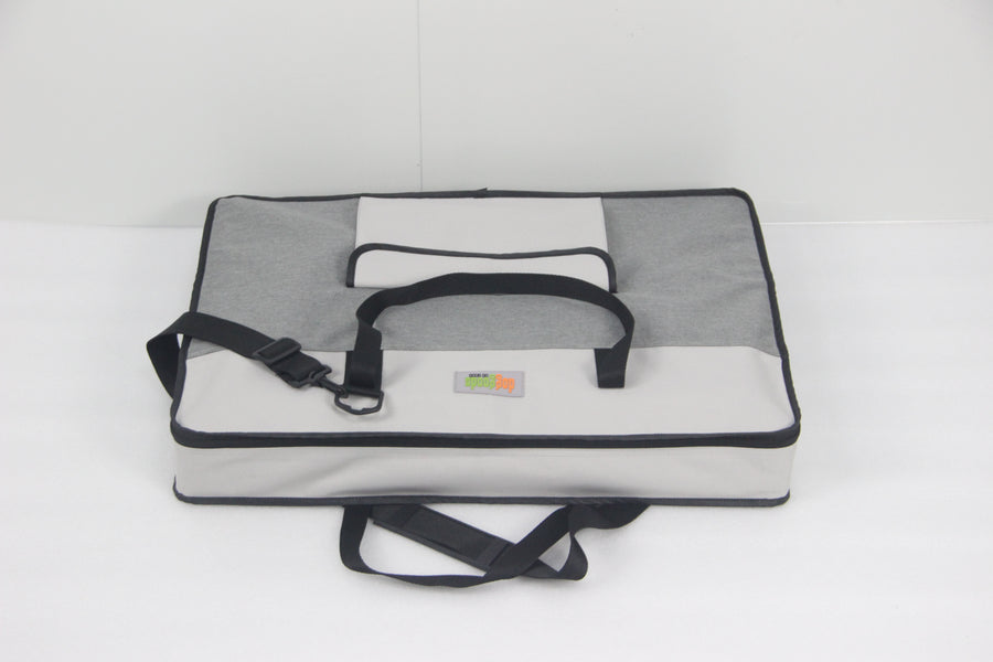 Compact and lightweight carrying case for the DogGoods foldable crate. Features sturdy handles and an adjustable shoulder strap for easy transport.